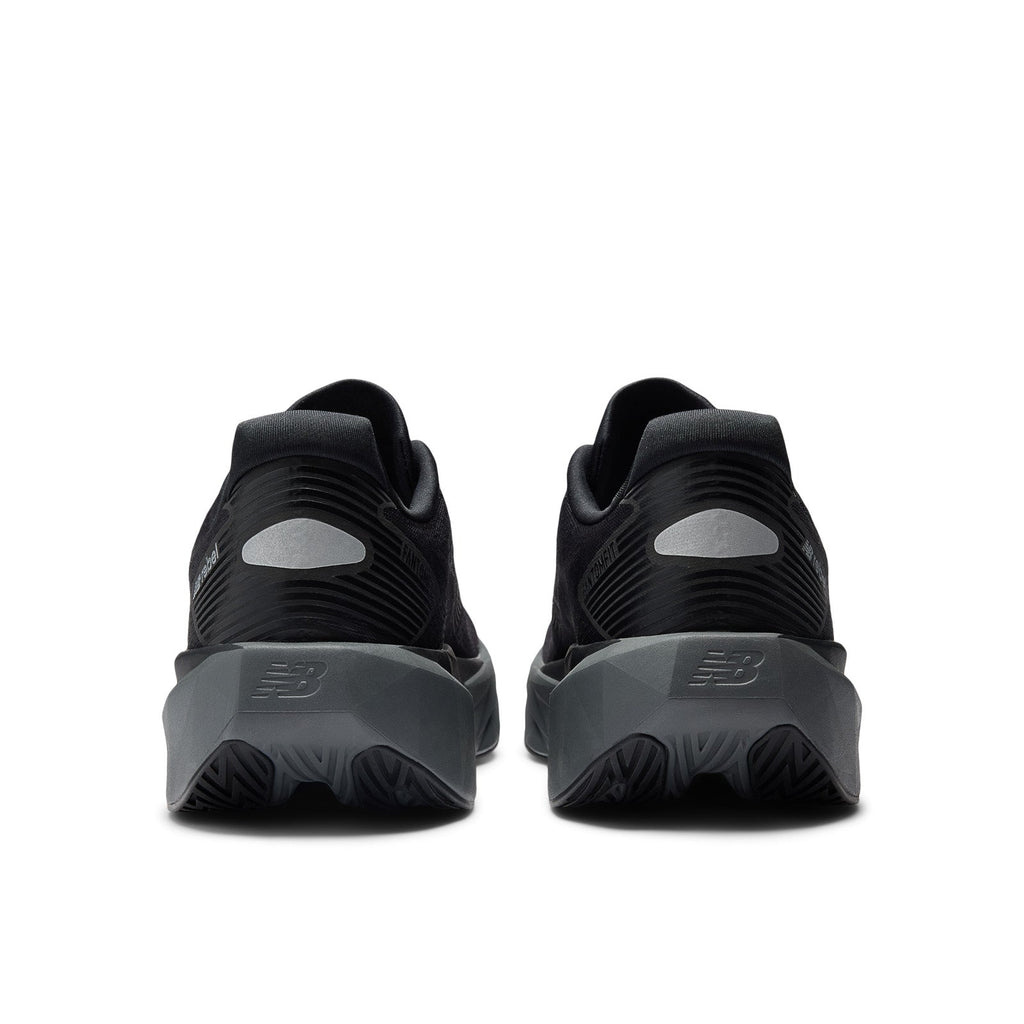 New Balance Men's FuelCell Rebel v5 in Black with Castlerock and Silver Metallic