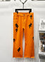 Chrome Hearts Bright Orange & Black Cross Patch Denim Jeans